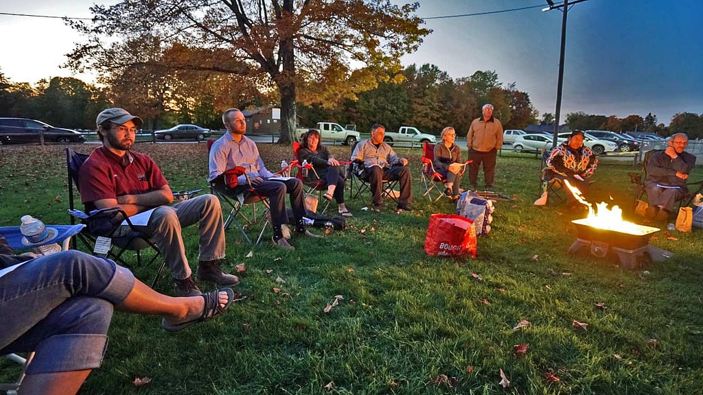 sitting around a maine camp fire