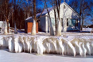 Layers Of Winter Ice Form On Aroostook County Lake Retainer Wall.