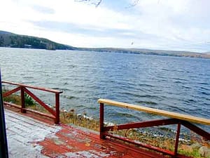 waterfront log camp lake view