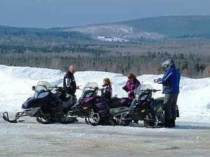 family snowmobiling maine trails