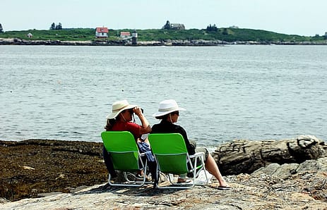 two sea coast ladies sunning photo